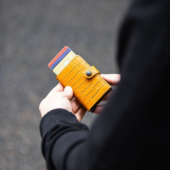 Geldbörse Secrid Miniwallet Cleo Ochre/Brown