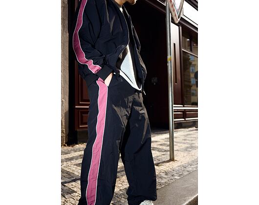 Hose Karl Kani - Signature Sidestripe Baggy Trackpants - Black